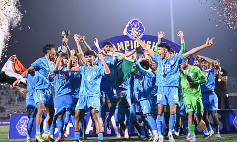 Team India celebrates with the trophy