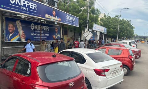 Cars parked on bus bay at Wallajah Road stretch 