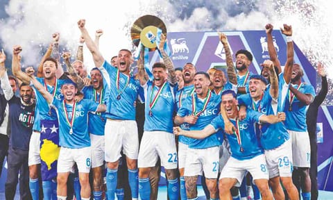  Napoli players celebrate after winning the title