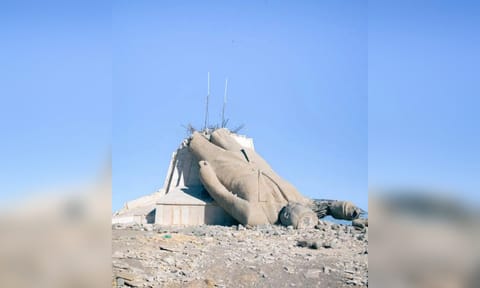 A destroyed statue of Hafez al-Assad. 