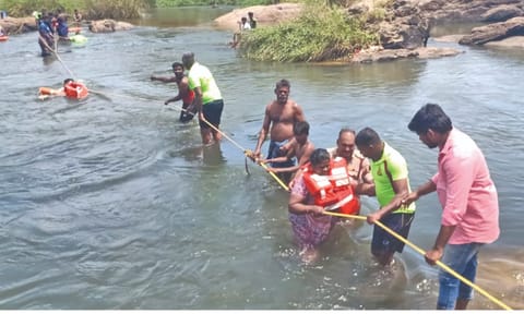 Fire and Rescue Services personnel help stranded villagers to safer place near Ambasamudram