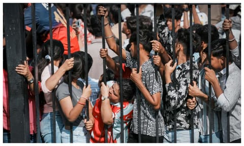 A crowd of fans gather at the Vidhana Soudha for the grand felicitation of IPL 2025 winning Royal Challengers Bengaluru team, in Bengaluru, Karnataka, Wednesday, June 4, 2025 (PTI)