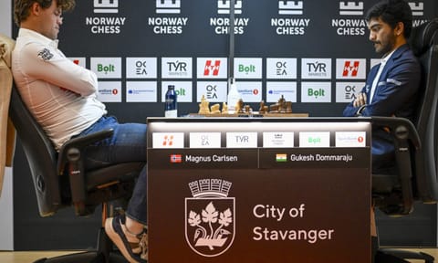 Magnus Carlsen and Gukesh during a game 