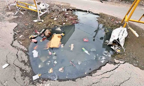 Overflowing manhole on Jaga Jeeva Ram Nagar Main Road