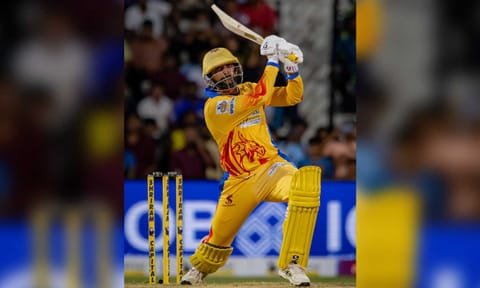  Varun Chakravarthy plays a shot during the match