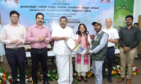 Minister Rajakannappan and officials with mahouts 