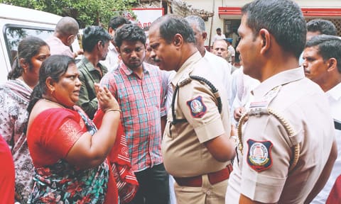Relatives of deceased Adithya arguing with police
