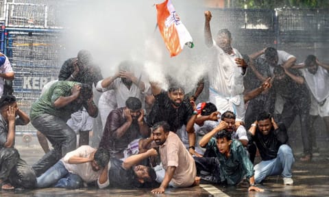 Police use water cannon to disperse Congress workers during a protest demanding the resignation of Kerala Health Minister Veena George over the death of a woman in a building collapse at Kottayam Medical College, in Thiruvananthapuram, Saturday, July 5, 2025 (PTI) 