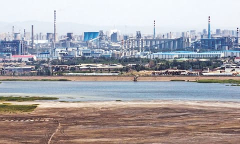 An artificial lake of sludge in Baotou, born of rare earth and iron ore processing waste