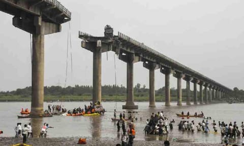Rescue operation underway after several vehicles fell into the Mahisagar river when a portion of a four-decade-old bridge collapsed, in Gujarat's Vadodara district, Wednesday, July 9, 2025 (PTI) 