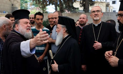 Latin Patriarch of Jerusalem Archbishop Pierbattista Pizzaballa, Greek Orthodox Patriarch of Jerusalem, Theophilos III, and Greek Orthodox Patriarchate Archbishop Alexios visit the Greek Orthodox Saint Porphyrius Church, in Gaza City Photo Credit: Reuters