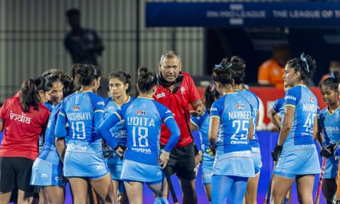 Indian women's team players huddle before a FIH Pro League match 