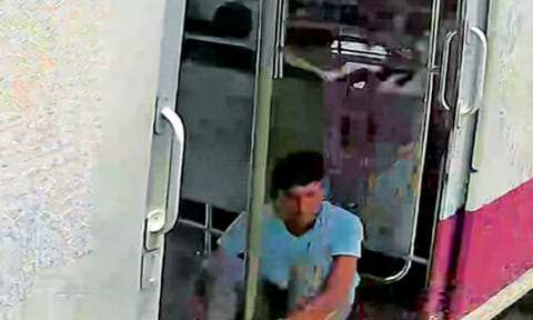 CCTV grab of the suspect on a train, released on Monday 