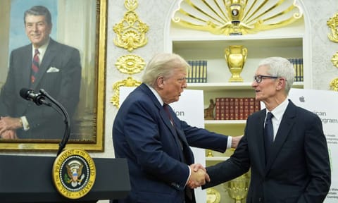 President Donald Trump shakes hands with Apple CEO Tim Cook in the Oval Office, Wednesday, Aug. 6, 2025, in Washington (AP) 