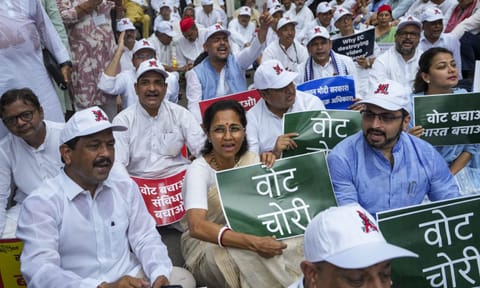 MP Supriya Sule and others during a protest march by INDIA bloc MPs from Parliament House to the Election Commission against the revision of electoral rolls in Bihar and alleged 'vote chori', in New Delhi, Monday, Aug. 11, 2025 (PTI) 