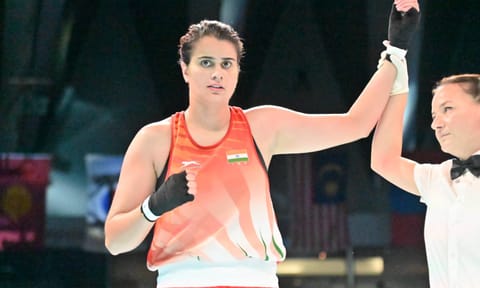 Ritika celebrates after winning gold 