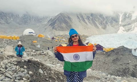 Archana Singh carrying the Indian flag at the Everest Base Camp 