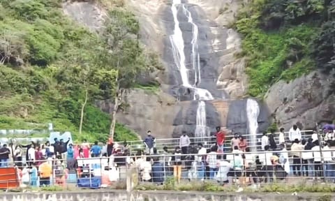 Tourists throng Silver Falls in Kodaikanal on Sunday 