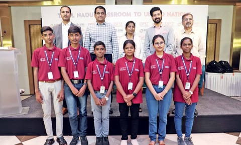 School Education Secretary Chandra Mohan (second from left) with students from different government schools across TN 
