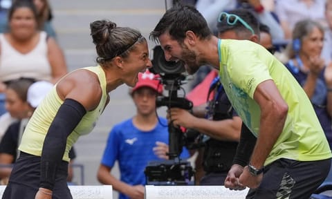 Sara Errani, of Italy, and Andrea Vavassori, of Italy, react after defeating Taylor Townsend, of the United States, and Donald Young, of the United States, in the mixed doubles final of the U.S. Open tennis championships, Thursday, Sept. 5, 2024, in New York (AP) 