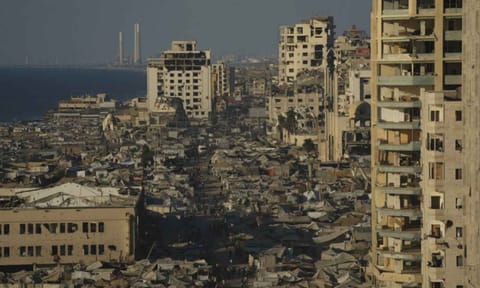 A makeshift tent camp for displaced Palestinians stretches across an area near the Gaza City port (AP Photo)