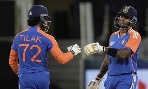 India's Tilak Varma, left, and batting partner Suryakumar Yadav celebrate scoring runs during the Asia Cup cricket match between India and Pakistan at Dubai International Cricket Stadium in Dubai, United Arab Emirates (PTI) 