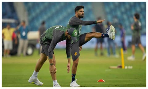 Pakistan's Haris Rauf and Shaheen Shah Afridi warm up before the start of the Asia Cup cricket match between Pakistan and United Arab Emirates at Dubai International Cricket Stadium, United Arab Emirates (PTI) 