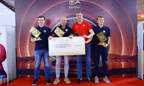 Poland's Wojciech Gawel, Przemyslaw Janiszewski, Buras Krzysztof, Piotr Marcinowski with the trophy 