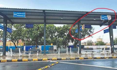 Signboards carrying SCB labels covered by gunny bags at Royapuram bus stand 