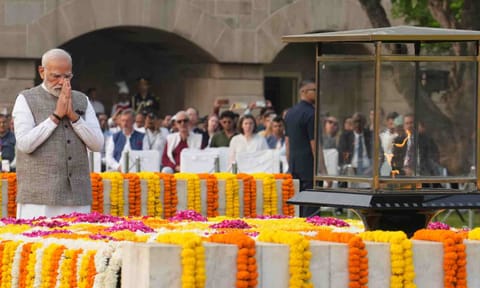 Prime Minister Narendra Modi pays homage to Mahatma Gandhi on his birth anniversary, at Rajghat in New Delhi, Thursday, Oct. 2, 2025 (PTI) 