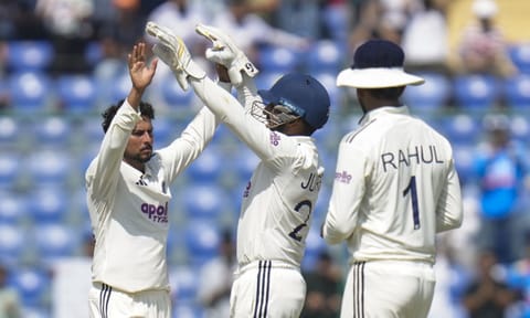  Kuldeep Yadav celebrates the wicket of West Indies' Jayden Seales as he completes his five-wicket haul on day three of the second and final Test cricket match of a series between India and West Indies, in New Delhi, Sunday, Oct. 12, 2025. (PTI)