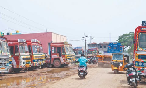 Container trucks parked at a residential area in Manali New Town