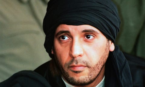 In this undated file photo made available Sept. 25, 2011, Hannibal Gadhafi, son of ousted Libyan leader Moammar Gadhafi, watches an elite military unit exercise in Zlitan, Libya. (Photo: AP)