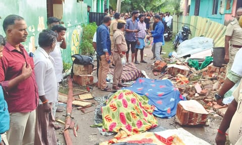 Police personnel at the explosion site
