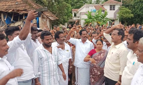 Parents and residents block Pattukkottai-Thanjavur main road in Pattukkottai on Monday 
