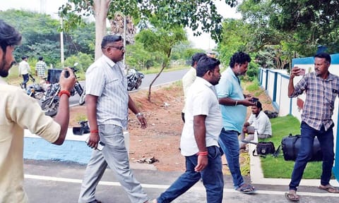Ambulance drivers arriving for inquiry in Karur on Friday