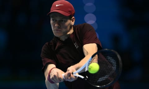 Jannik Sinner hits the ball during the match