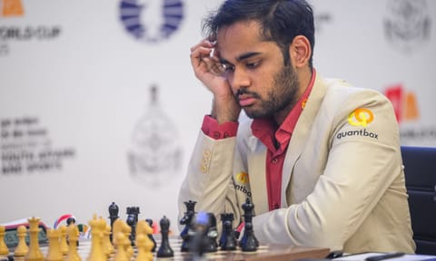 Arjun Erigaisi seen thinking before making a move during his match