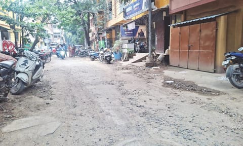 Muddy surface of Alwarpet Street turns slushy when it rains, making it risky for motorists to navigate. 