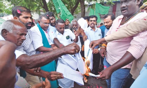 CRRC members burn copies of Supreme Court order rejecting Tamil Nadu’s plea against Mekedatu dam on Monday. 
