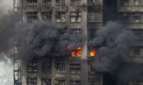 Fire engulfs high-rise Hong Kong building (AP) 