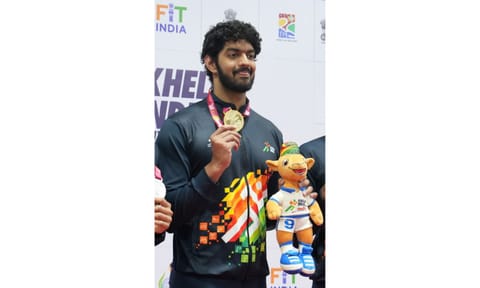Srihari Nataraj poses with the gold medal 