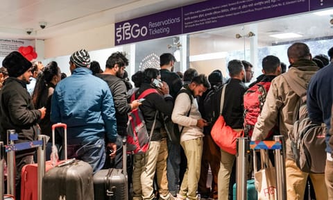 Passengers stand in a queue at an IndiGo airline's counter at Terminal 1 (T1) of the Indira Gandhi International Airport, in New Delhi, Saturday, Dec. 6, 2025. (PTI) 