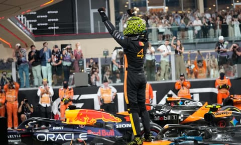McLaren driver Lando Norris of Britain reacts after becoming a world champion after the Abu Dhabi Formula One Grand Prix in Abu Dhabi, United Arab Emirates, Sunday, Dec. 7, 2025 (AP) 