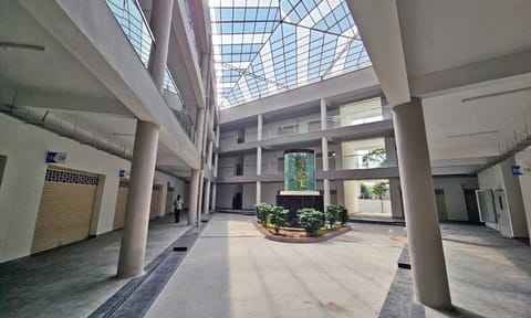 Rows of shops with closed shutters at the Kolathur centre