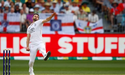England’s Mark Wood bowls a delivery on day two of the first Ashes cricket test match between Australia and England in Perth, Saturday, Nov. 22, 2025. (AP) 