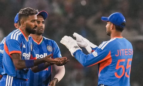 India's Hardik Pandya celebrates with Jitesh Sharma after taking the wicket of South Africa's David Miller during the first T20I cricket match between India and South Africa at Barabati Stadium (PTI)