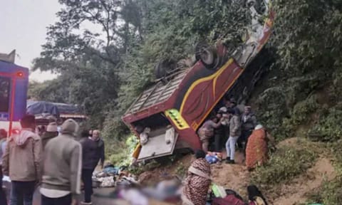 Rescue work underway after a bus fell off a road and turned turtle, in Alluri Sitaramaraju district, Andhra Pradesh, Friday, Dec. 12, 2025 (PTI) 