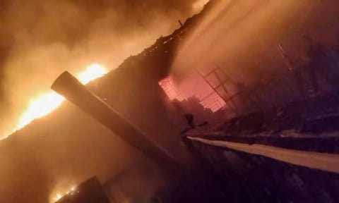 Smoke and flames billow after a fire broke out due to a cylinder blast at a nightclub, in North Goa, after midnight on Sunday, Dec. 7, 2025. (PTI) 