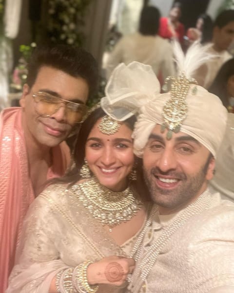 Filmmaker Karan Johar with the couple